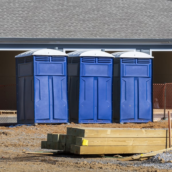 how often are the portable restrooms cleaned and serviced during a rental period in Gilman Minnesota